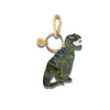 Dinosaur-shaped keychain with gold accents on a white background