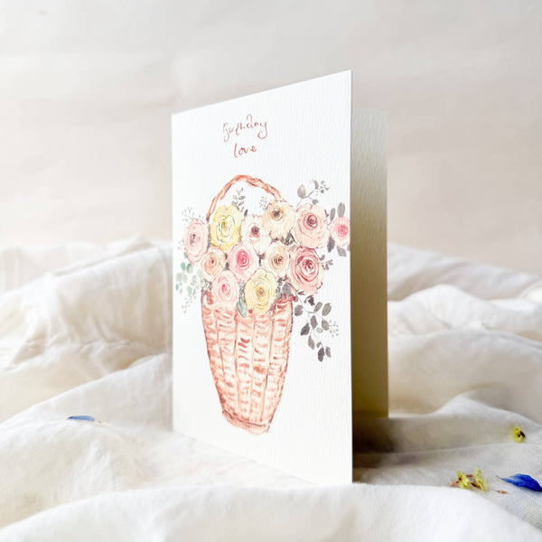 Greeting card with floral design on a white surface