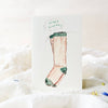 Greeting card with a sock design and 'Happy birthday' text on a white background