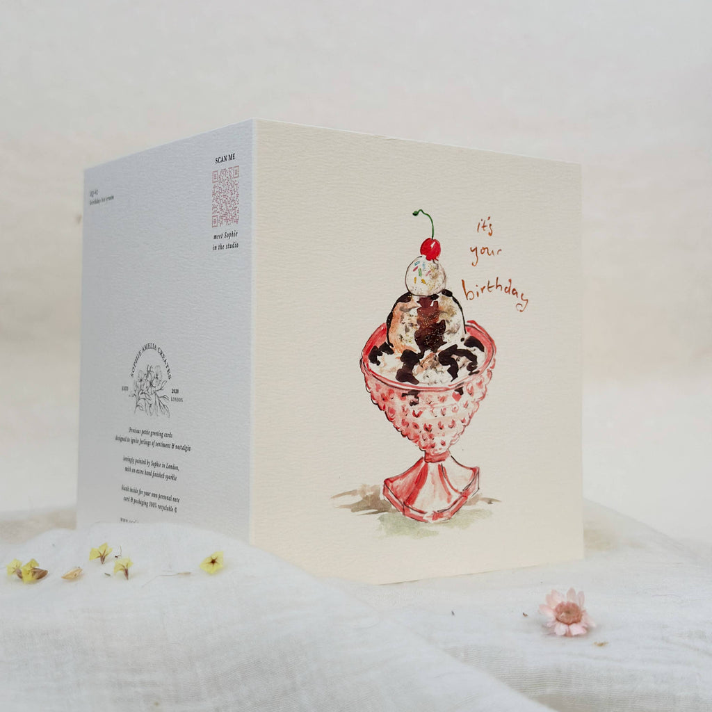 Greeting card with ice cream sundae illustration on a white background