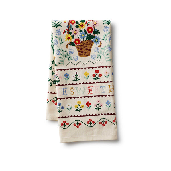 Decorative towel with floral patterns and 'LOVE' text on a white background