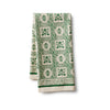 Set of two green and white patterned towels on a white background