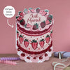 Card with a cake design featuring strawberries and 'Just Married' text on a pink background.