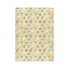 Patterned paper with colorful floral design on a beige background