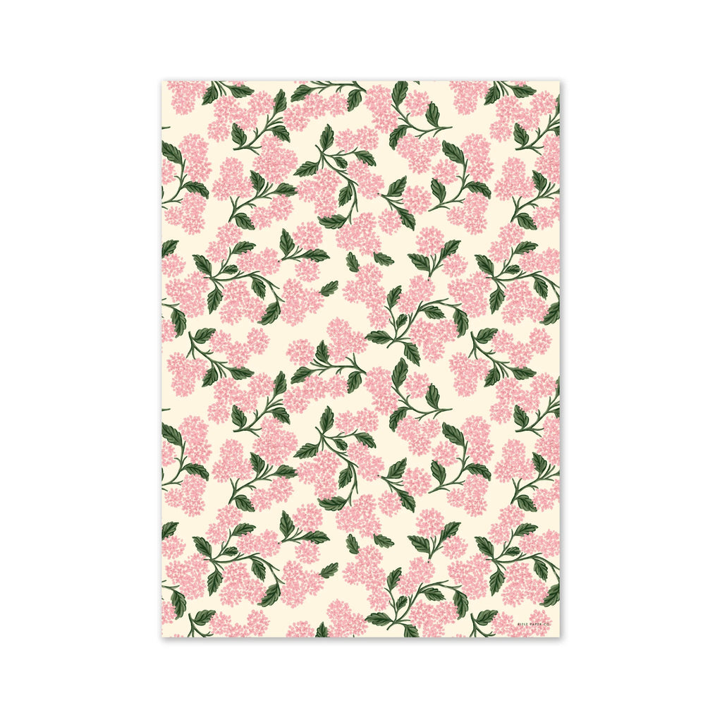 Notebook with pink floral pattern on a white background