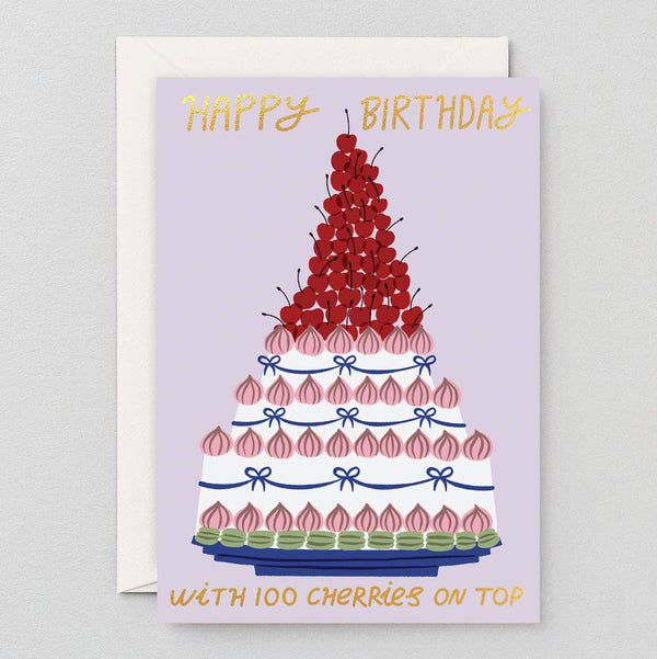 Birthday card with a cake illustration and cherry details on a light purple background