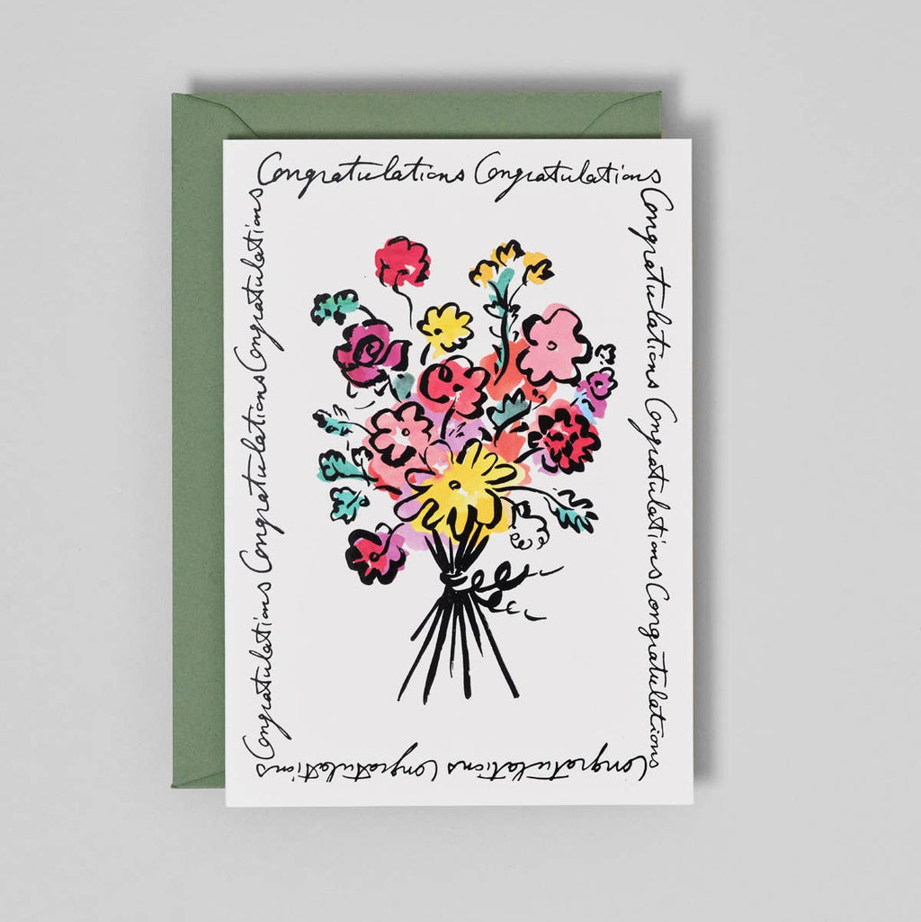 Greeting card with floral design and 'Congratulations' text on a gray background