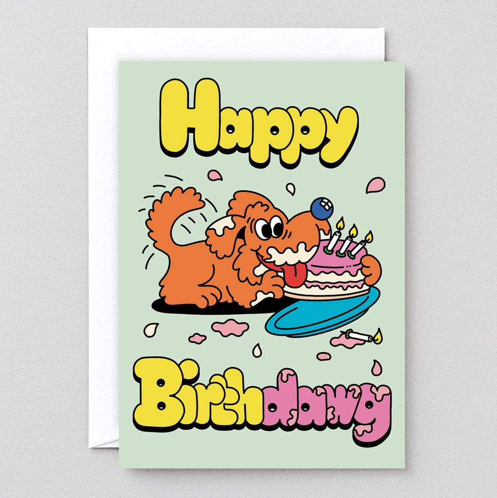 Birthday card with cartoon dog and cake on a light green background
