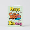 Birthday card with cartoon dog and cake on a light green background