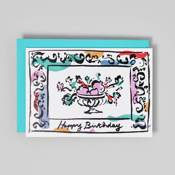 Birthday card with decorative design and 'Happy Birthday' text on a gray background