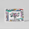 Colorful birthday card with decorative border and 'Happy Birthday' text on a gray background