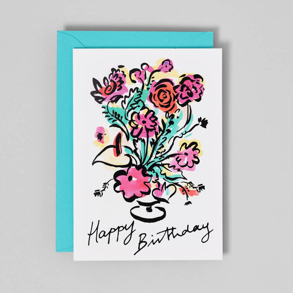 Birthday card with colorful floral design and 'Happy Birthday' text on a gray background