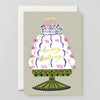Greeting card with a birthday cake illustration on a beige background