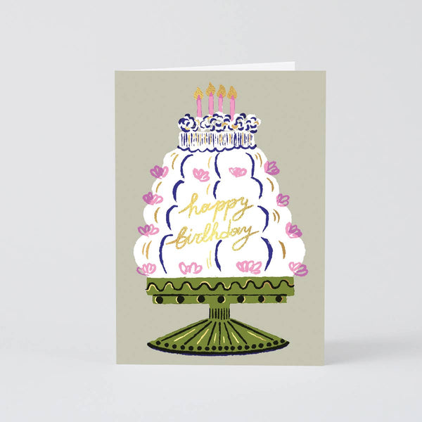 Greeting card with a birthday cake illustration and 'happy birthday' text on a beige background