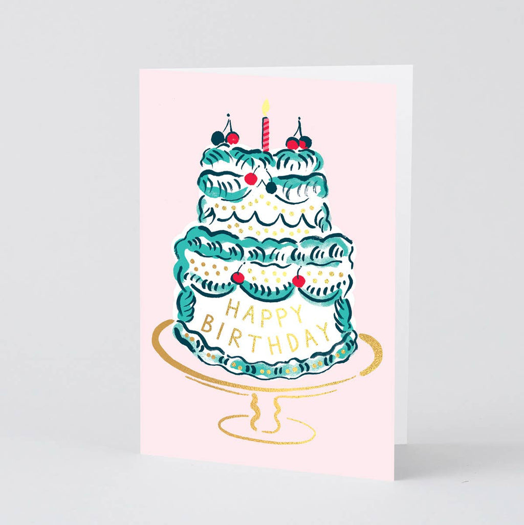 Greeting card with a birthday cake illustration on a light pink background
