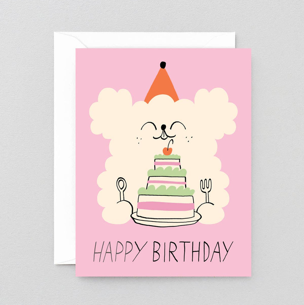 Birthday card with a cartoon dog and cake on a pink background