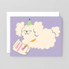 Greeting card with a cloud character holding a birthday scroll on a purple background