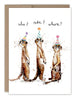 Card with three meerkats wearing party hats and text 'who? cake? where?' on a white background.