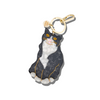 Cat-shaped keychain with gold chain on a white background