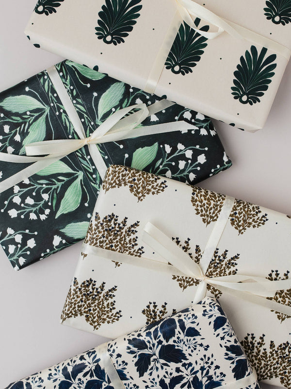 Gift boxes with floral patterns on a white background