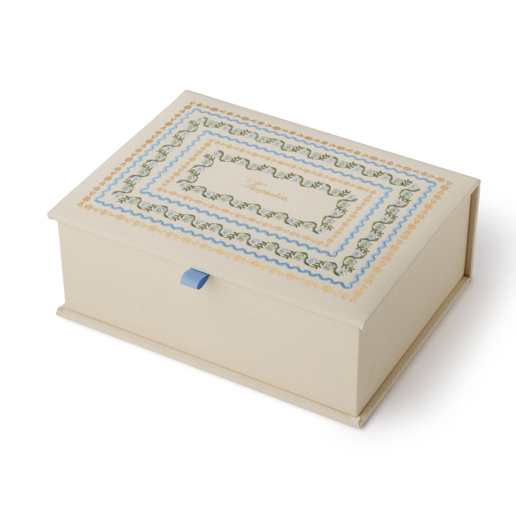 Decorative box with intricate patterns on a white background