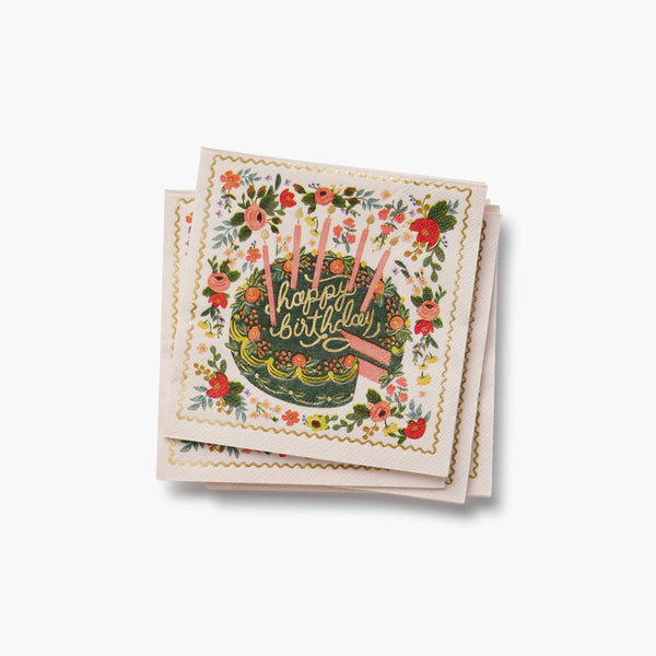 Stack of birthday cards with floral and cake design on a white background