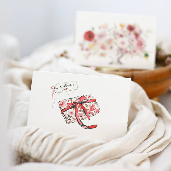 White towel with a decorative label on a white background