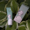 Hand cream tube and packaging with 'Aloe Vera' text on green leaves