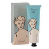 Divine hand cream with packaging featuring illustrations of a woman's face.