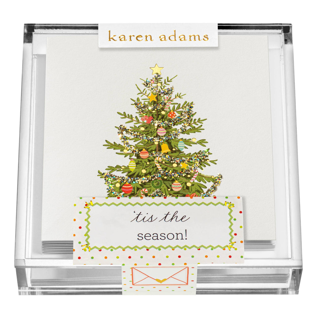 Christmas card with a decorated tree and 'tis the season! text, featuring the brand 'karen adams'.
