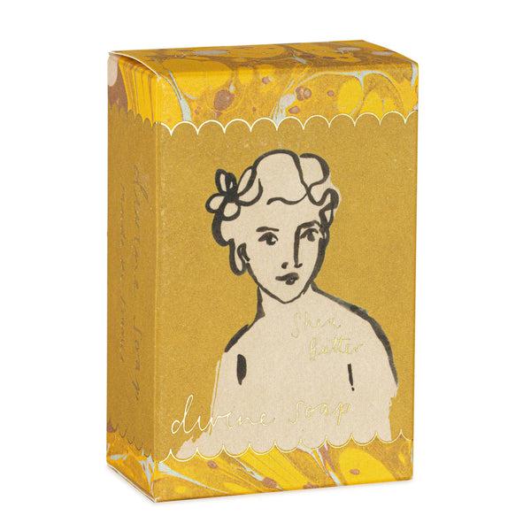 Yellow box with a vintage-style illustration of a woman's face on a white background