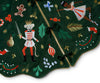 Decorative green Christmas tree skirt with embroidered festive designs on a white background
