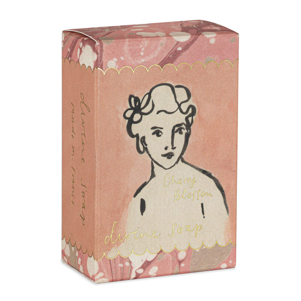 Box of soap with a vintage-style illustration of a woman on a pink background