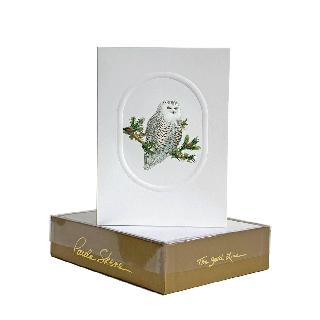 Decorative card with a snowy owl design in a clear box on a white background