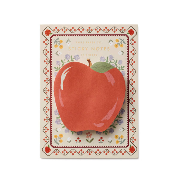 Notebook with a red apple illustration on a decorative cover