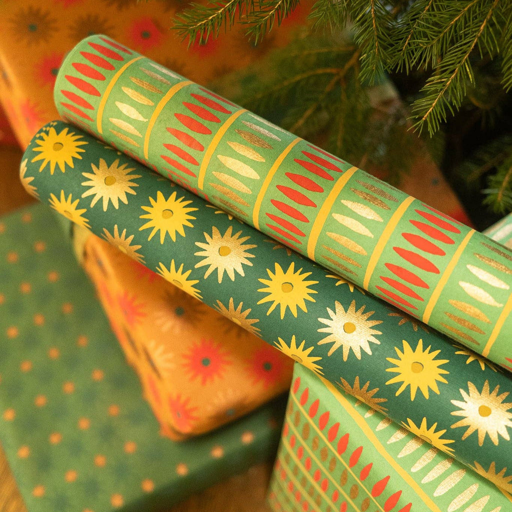 Gift wraps with sunflower design under a Christmas tree
