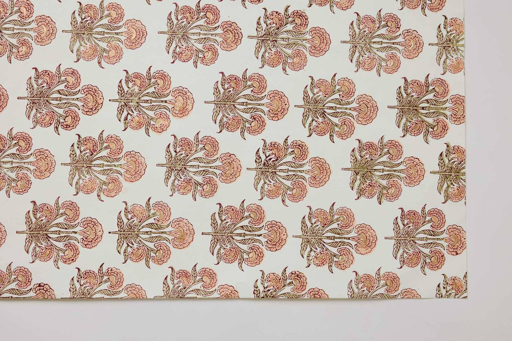 Patterned fabric with floral design on a plain background