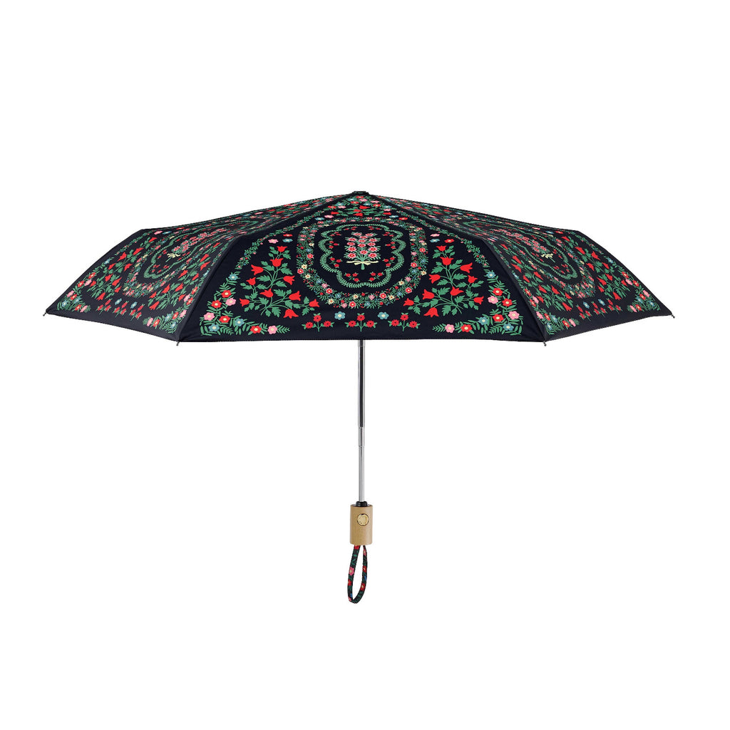 Decorative umbrella with floral pattern on a white background