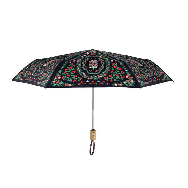 Decorative umbrella with floral pattern on a white background