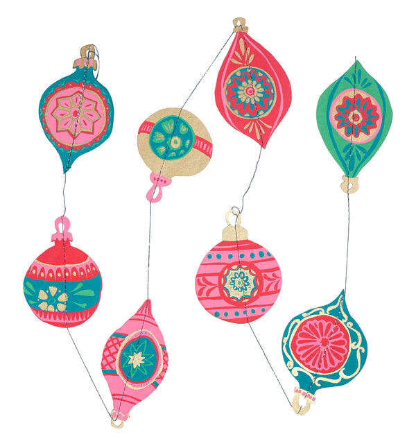 Colorful hanging decorations with floral patterns on a white background