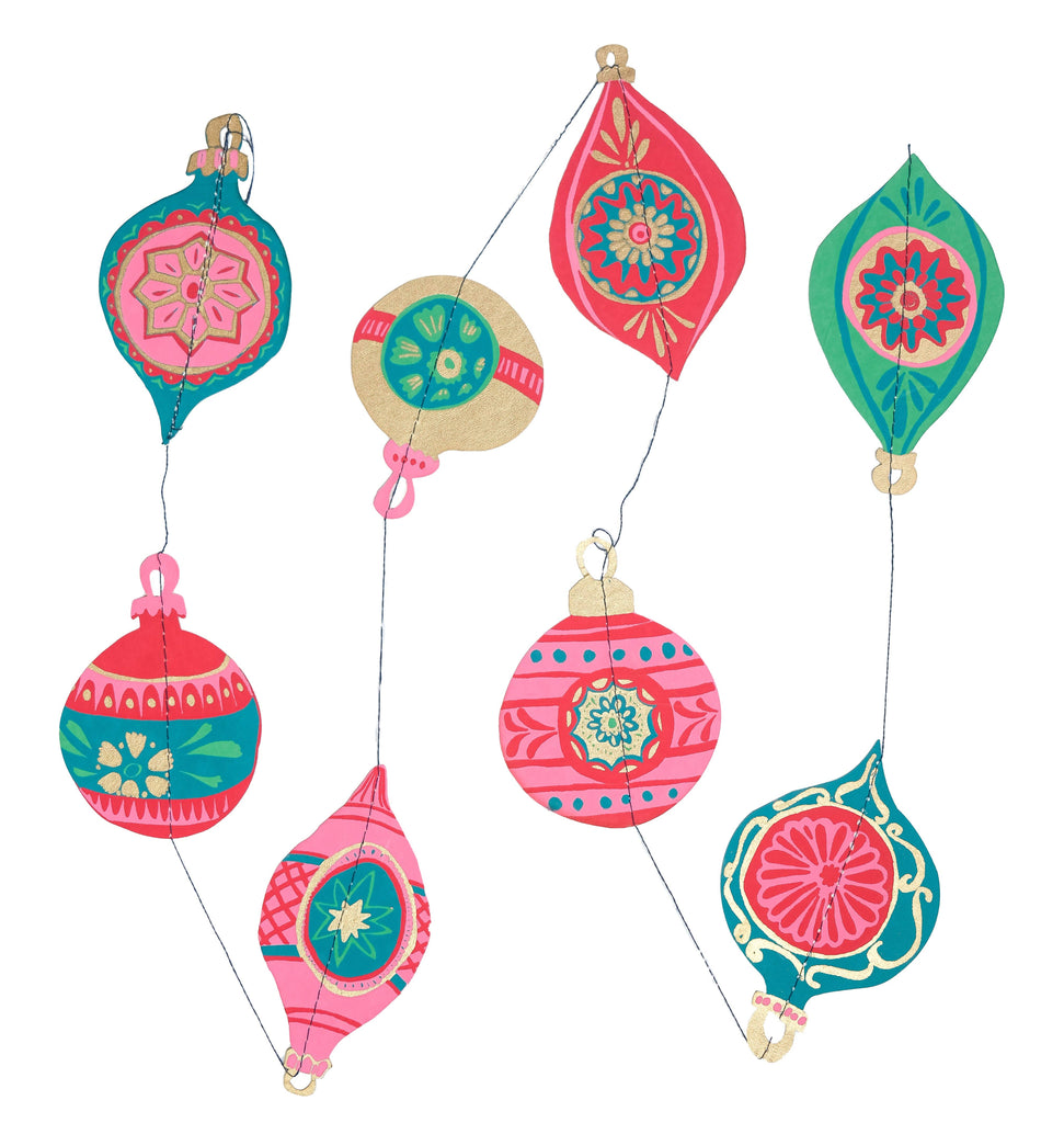Colorful hanging decorations with floral patterns on a white background