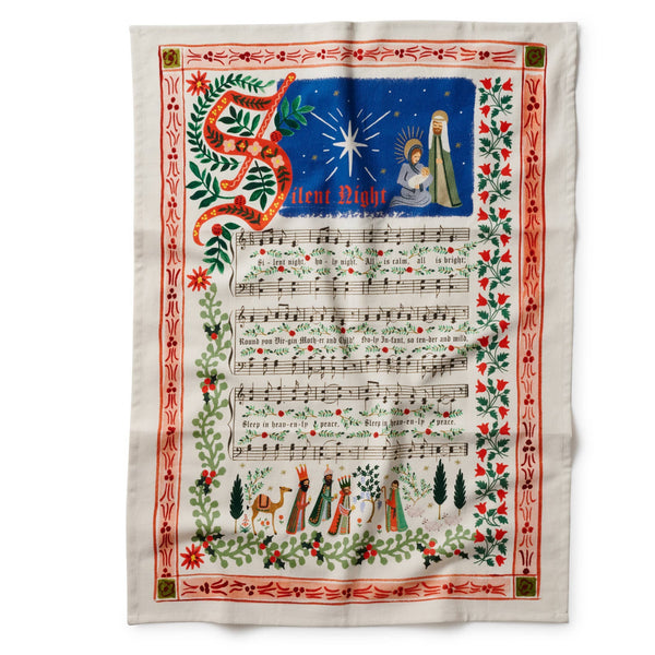 Decorative towel with Christmas-themed design featuring music notes and festive elements on a white background.