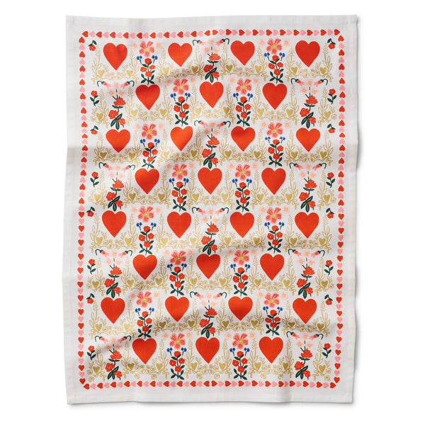 Fabric with red heart and floral pattern on a white background