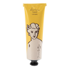 Hand cream tube with yellow label and black and white illustration on a white background