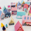 Advent calendar with house-shaped boxes on a white background