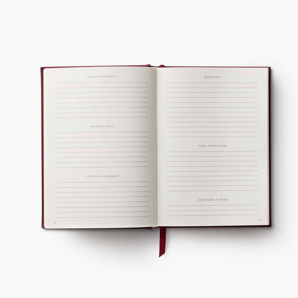 Open notebook with lined pages on a white background