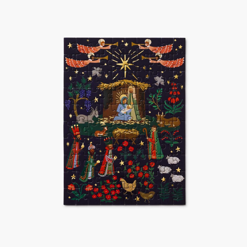 Decorative nativity scene with colorful figures and elements on a dark background